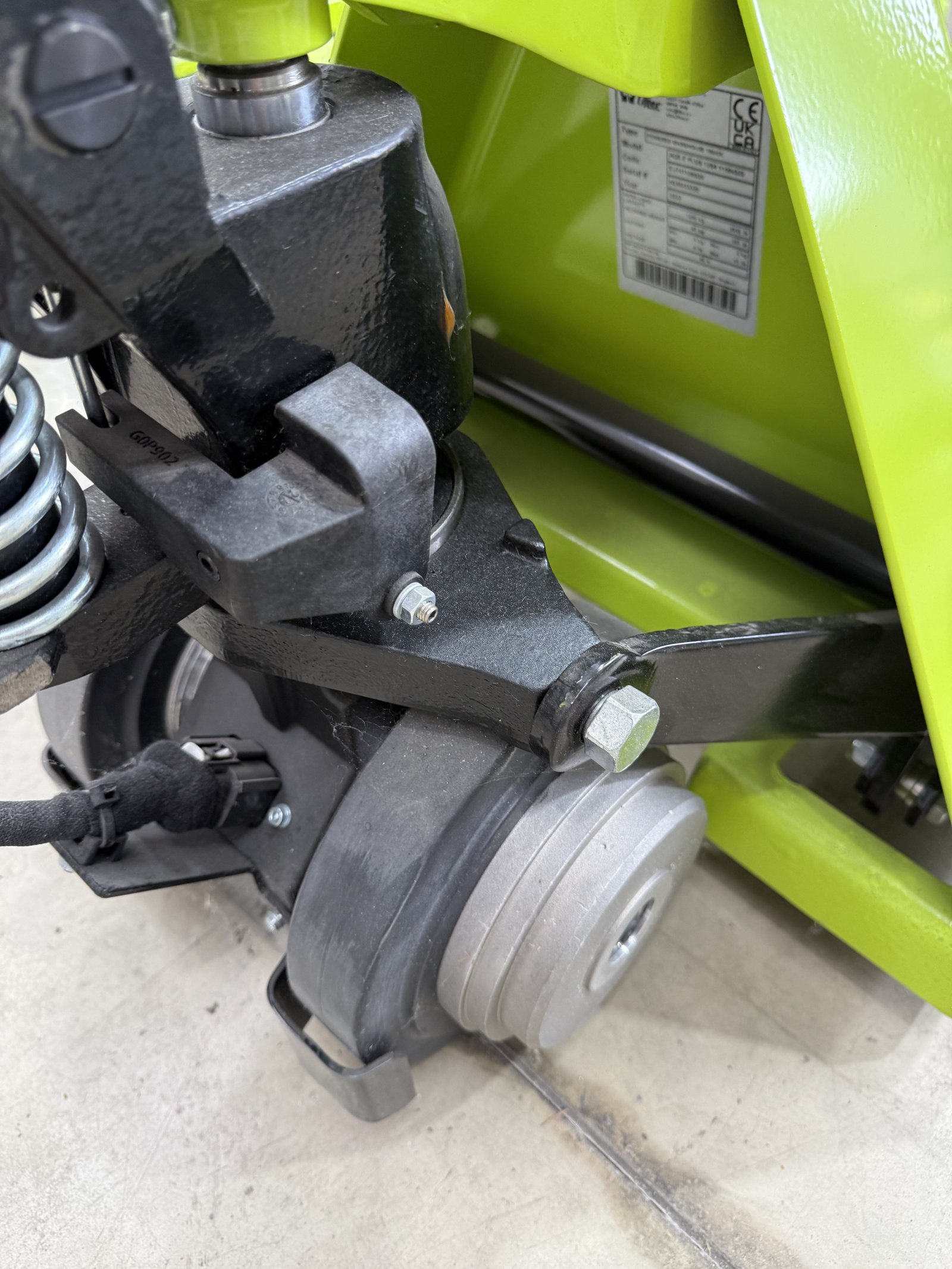 High lift pallet truck with scissor lift mechanism